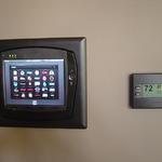 Crestron 8X-GA Wi-Fi Touchpanel installed with In-Wall Dock and Crestron Thermostat
