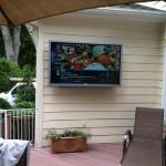 65" SunBrite Outdoor Display. Components located in Garage behind TV. 